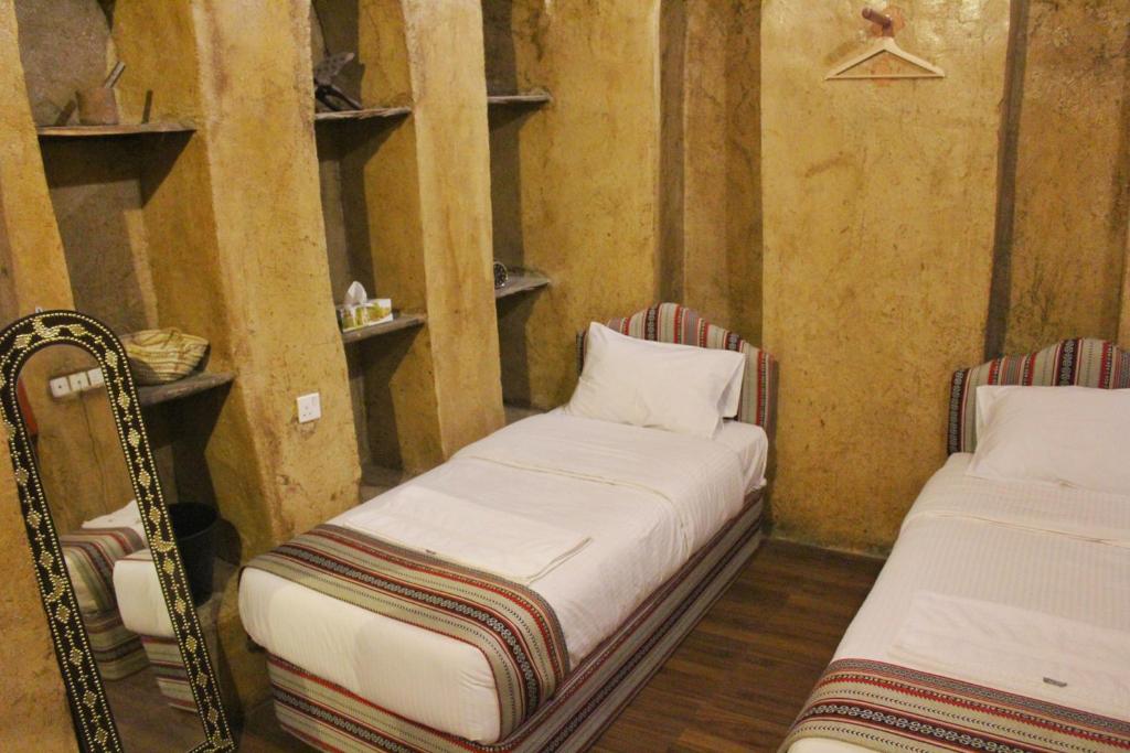 Двухместный (Двухместный номер с 2 отдельными кроватями и общим туалетом) загородного отеля Nizwa Heritage Inn, Низва