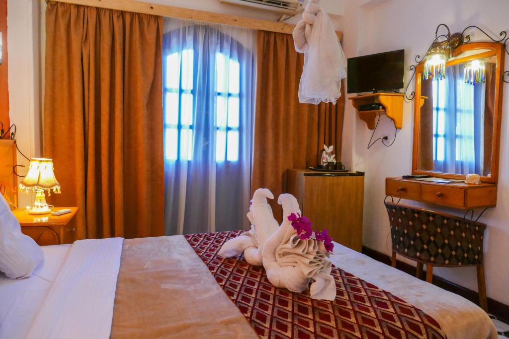 Двухместный (Двухместный номер с 1 кроватью или 2 отдельными кроватями) отеля El Gezira Garden Hotel Luxor, Луксор