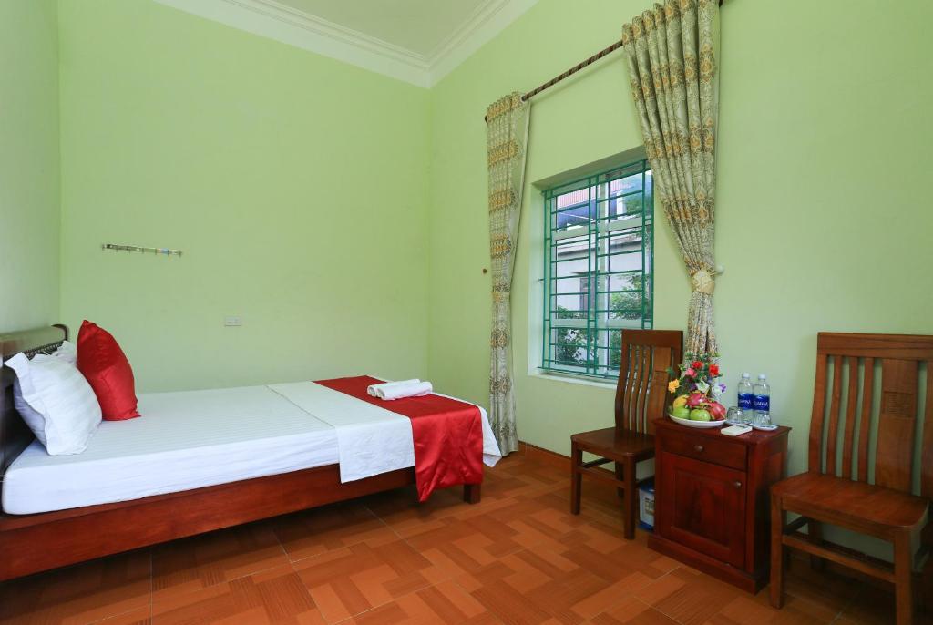 Двухместный (Двухместный номер с 1 кроватью и общей ванной комнатой) семейного отеля Tam Family Homestay, Ниньбинь