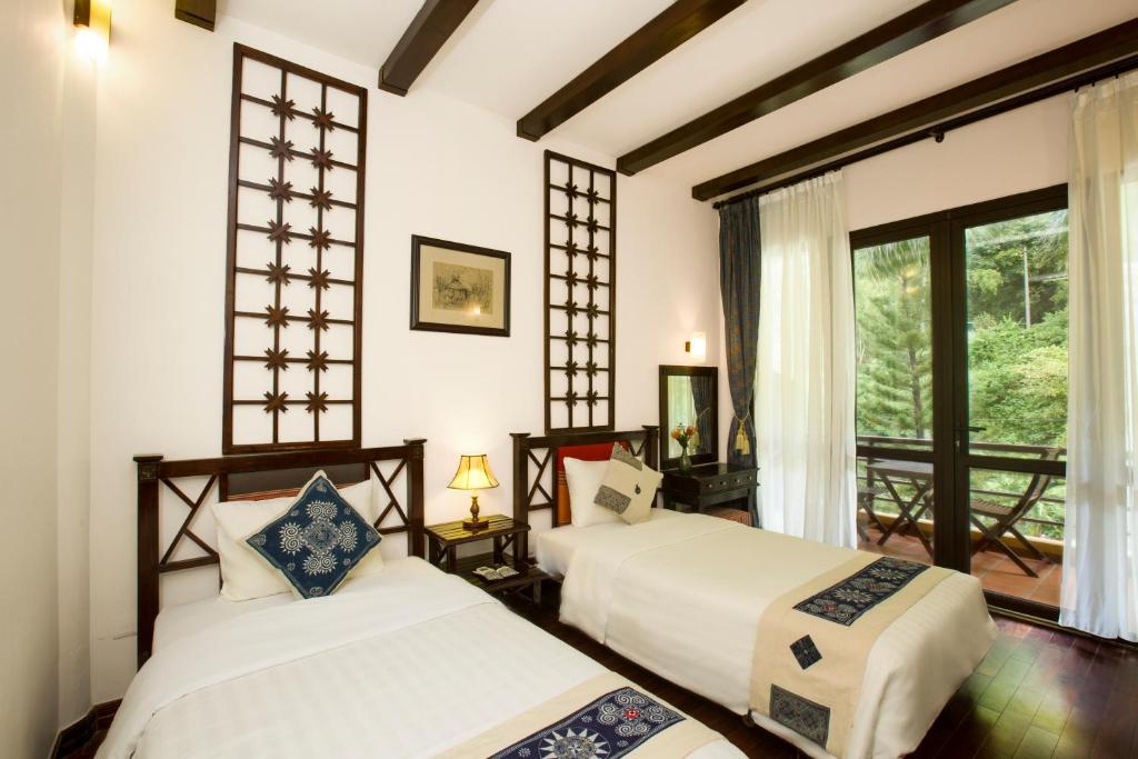 Двухместный (Двухместный номер Делюкс с 2 отдельными кроватями и видом на горы) отеля Mai Chau Lodge, Май Чау