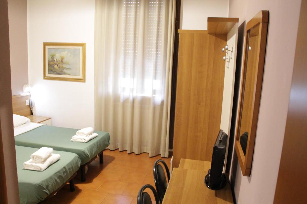 Двухместный (Стандартный двухместный номер с 2 отдельными кроватями и общей ванной комнатой) отеля Ca' Grande, Милан