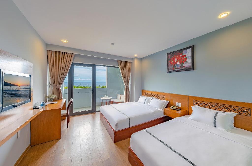 Двухместный (Двухместный номер Делюкс с 2 отдельными кроватями и видом на море) отеля Fansipan Da Nang Hotel, Дананг