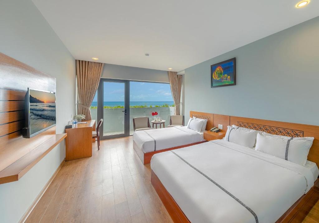 Двухместный (Двухместный номер Гранд Делюкс с 2 отдельными кроватями, вид на море) отеля Fansipan Da Nang Hotel, Дананг