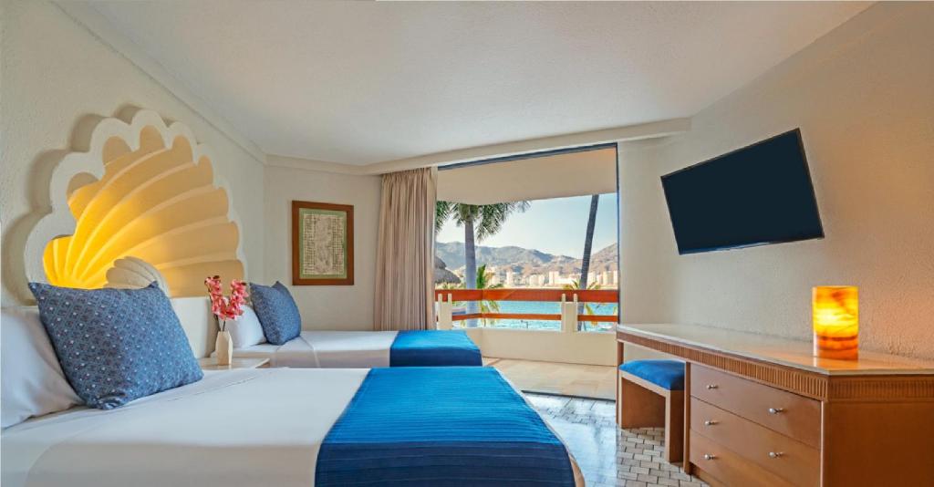 Двухместный (Номер Делюкс с частичным видом на море) отеля Park Royal Acapulco-All Inclusive Family Beach Resort, Акапулько-де-Хуарес