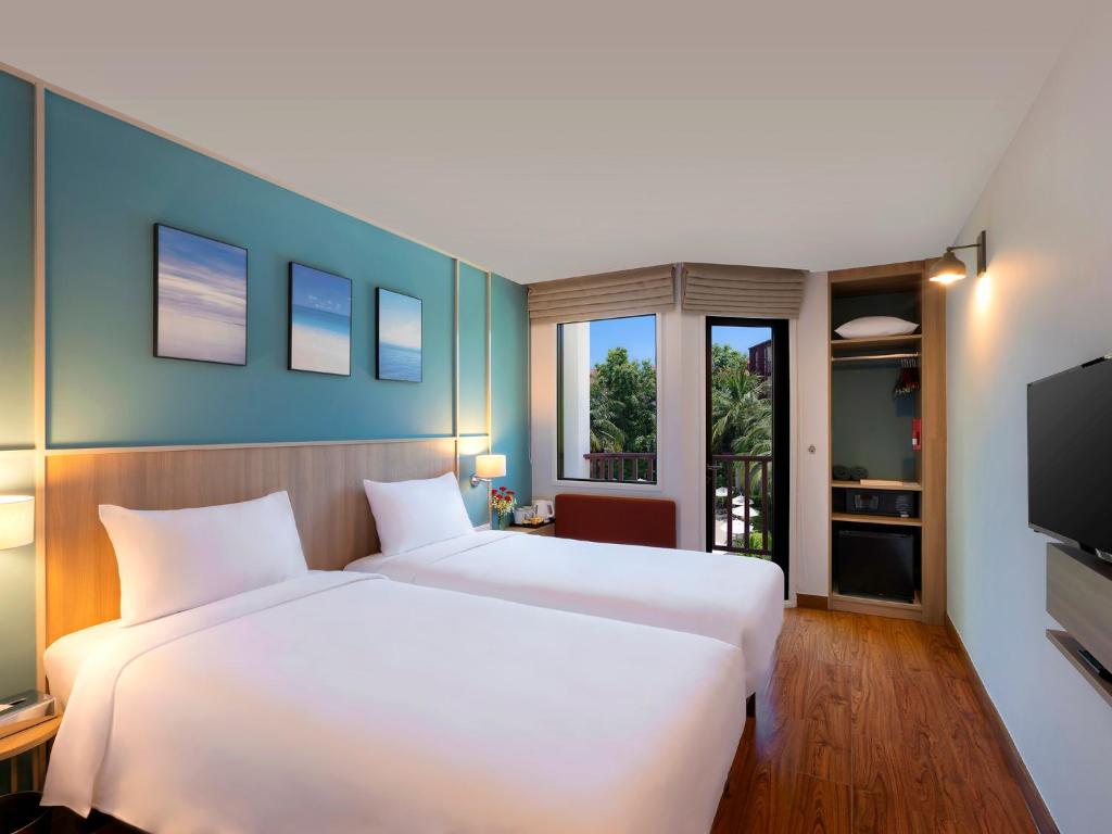 Двухместный (Улучшенный двухместный номер с 2 отдельными кроватями) отеля Ibis Phuket Patong, Пхукет