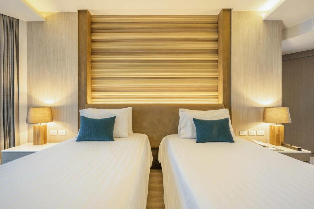 Двухместный (Угловой двухместный номер «Делюкс» с 1 кроватью или 2 отдельными кроватями) отеля Cape Dara Resort, Паттайя