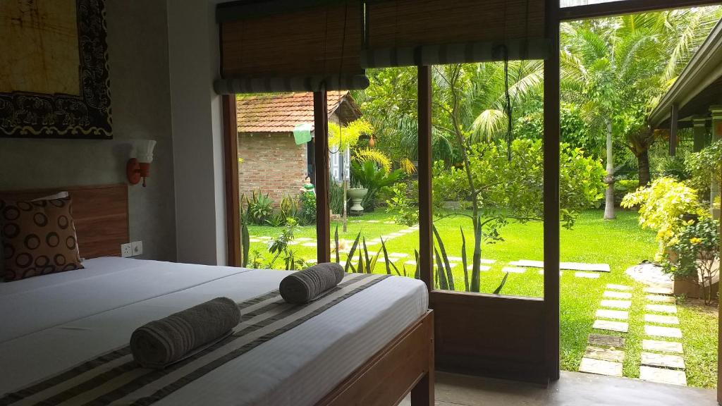 Двухместный (Deluxe Double with Garden & Canal View), Green Wood Villa Negombo