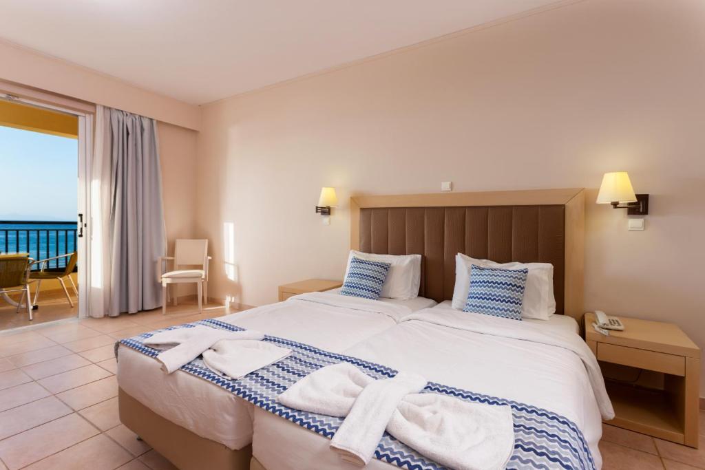 Двухместный (Большой двухместный номер с 1 кроватью или 2 отдельными кроватями) отеля ALYKANAS VILLAGE RESORT, Аликанас