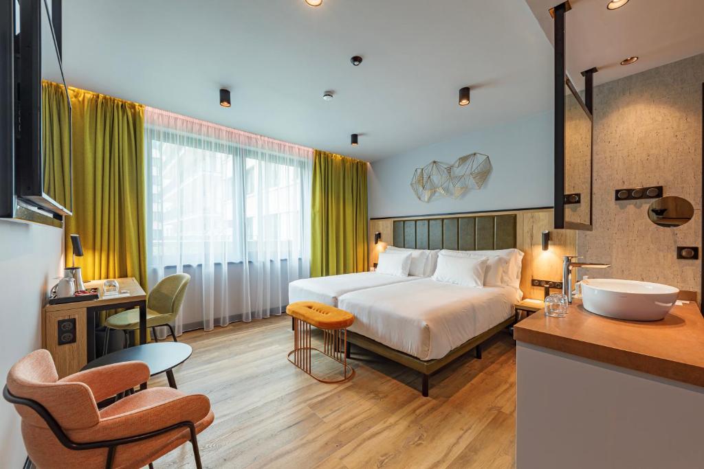 Двухместный (Улучшенный двухместный номер с 1 кроватью или 2 отдельными кроватями) отеля Barceló Budapest, Будапешт