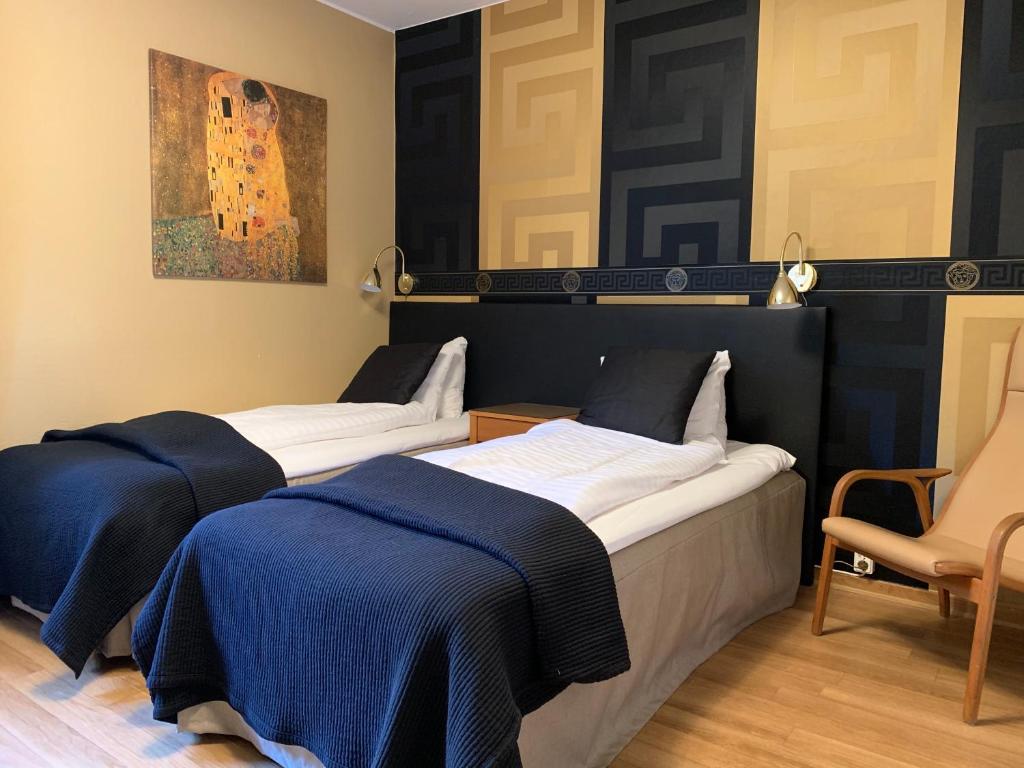 Двухместный (Стандартный двухместный номер с 2 отдельными кроватями) отеля Hotel Wictoria, Мариестад