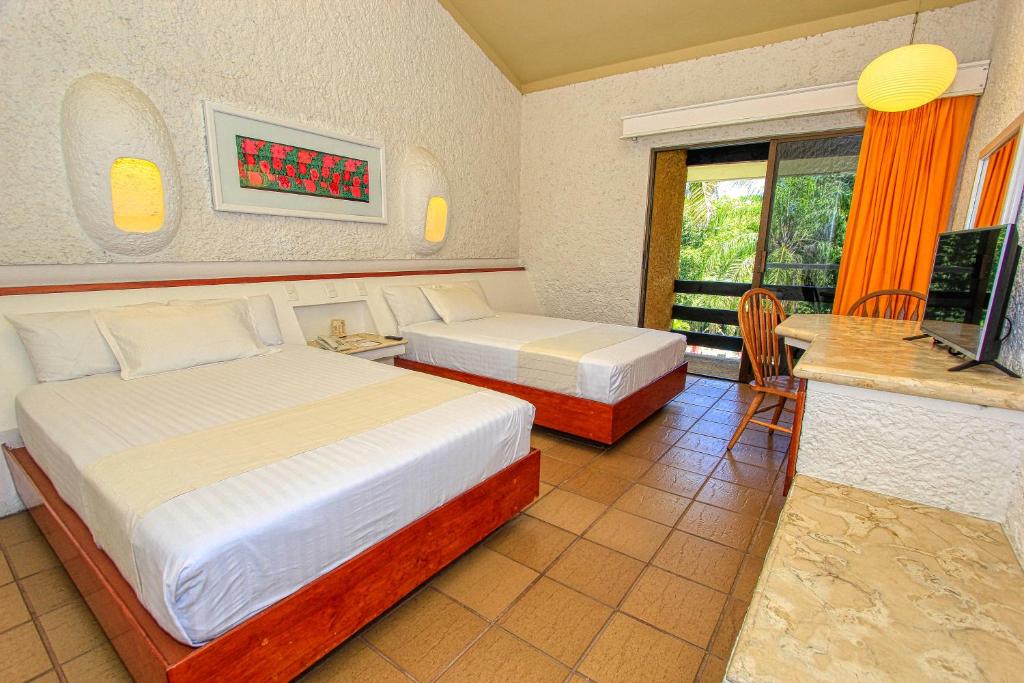 Трехместный (Трехместный номер) отеля Hotel Ciudad Real Palenque, Паленке