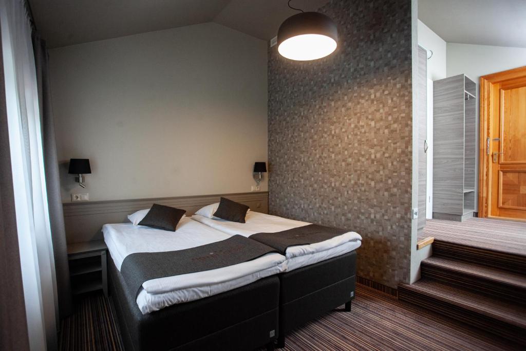 Двухместный (Двухместный номер с 1 кроватью или 2 отдельными кроватями) отеля Hotel Cēsis, Цесис