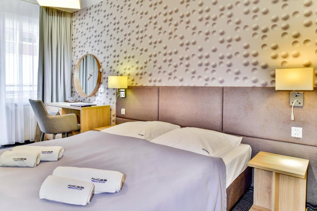 Двухместный (Двухместный номер Делюкс с 1 кроватью или 2 отдельными кроватями) курортного отеля Akces Medical Fit & Spa, Дзвижино