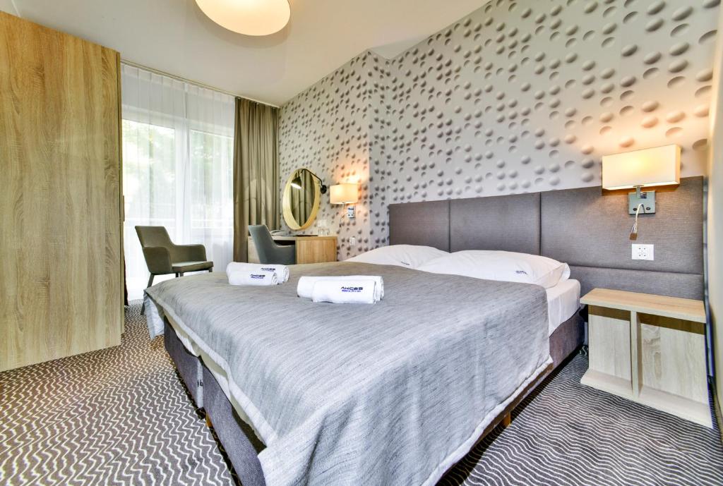 Двухместный (Стандартный двухместный номер с 1 кроватью или 2 отдельными кроватями) курортного отеля Akces Medical Fit & Spa, Дзвижино