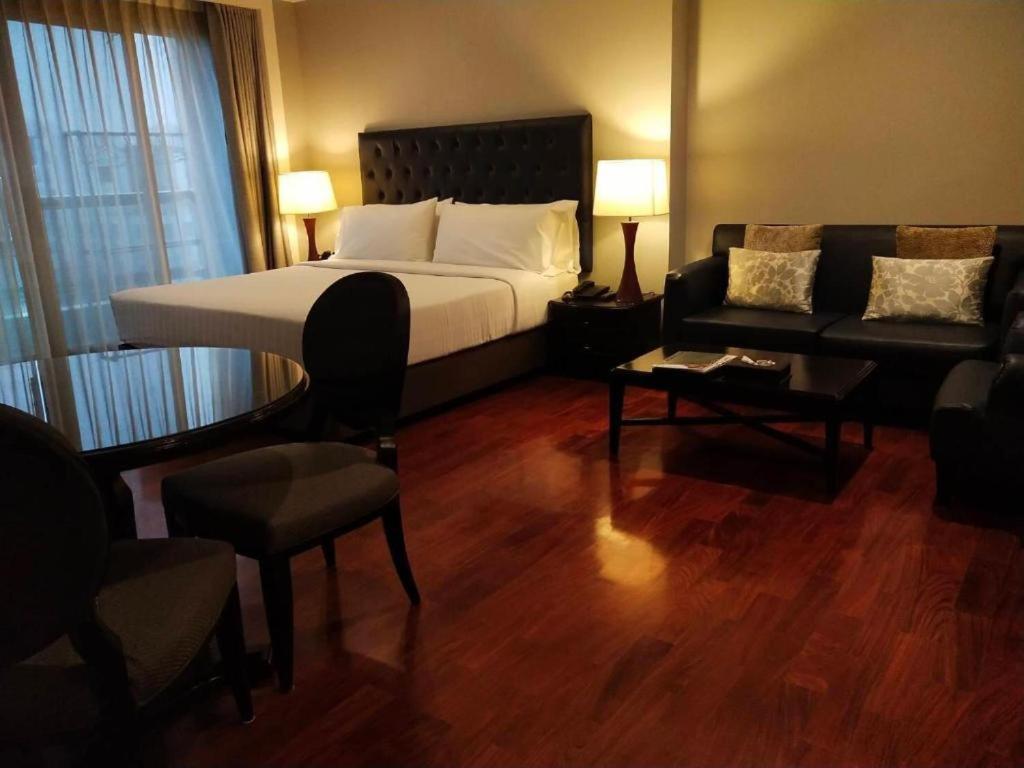 Двухместный (Двухместный номер с 1 кроватью и общей ванной комнатой) отеля GM Suites, Бангкок