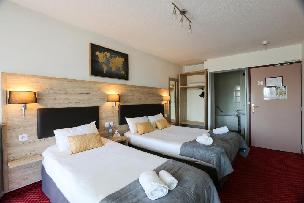 Двухместный (Двухместный номер с 2 отдельными кроватями) отеля Brit Hotel Bleu Nuit, Сент
