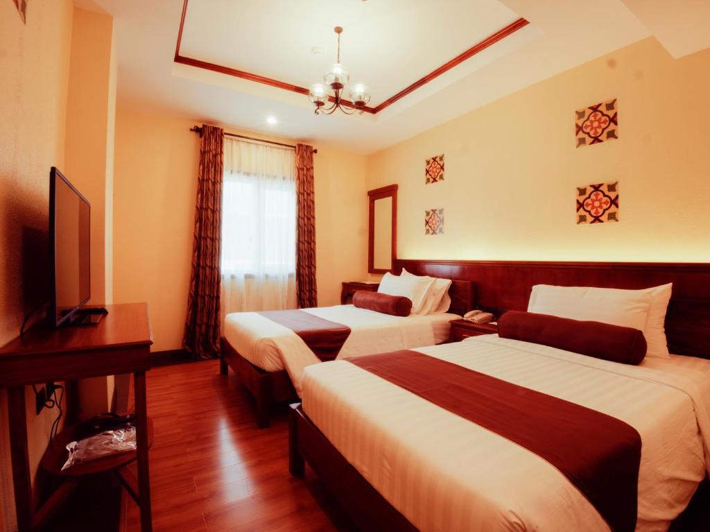 Двухместный (Улучшенный двухместный номер с 2 отдельными кроватями) отеля Sunlight Guest Hotel, Coron, Palawan, Корон