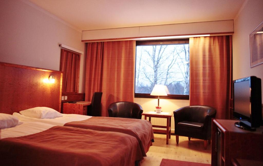 Двухместный (Двухместный номер с 2 отдельными кроватями - Одноместное размещение) отеля Hotel Ivalo, Ивало