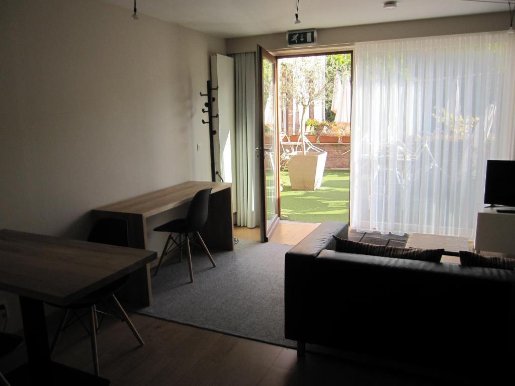 Апартаменты (Улучшенные апартаменты с террасой) апартамента Bonobo Apart Hotel, Брюгге