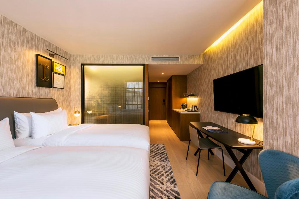 Двухместный (Улучшенный номер) отеля Radisson Blu Hotel Casablanca City Center, Касабланка