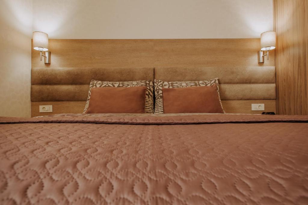 Двухместный (Стандартный двухместный номер с 1 кроватью или 2 отдельными кроватями) отеля Apartments and Rooms Villa Martini, Винковци