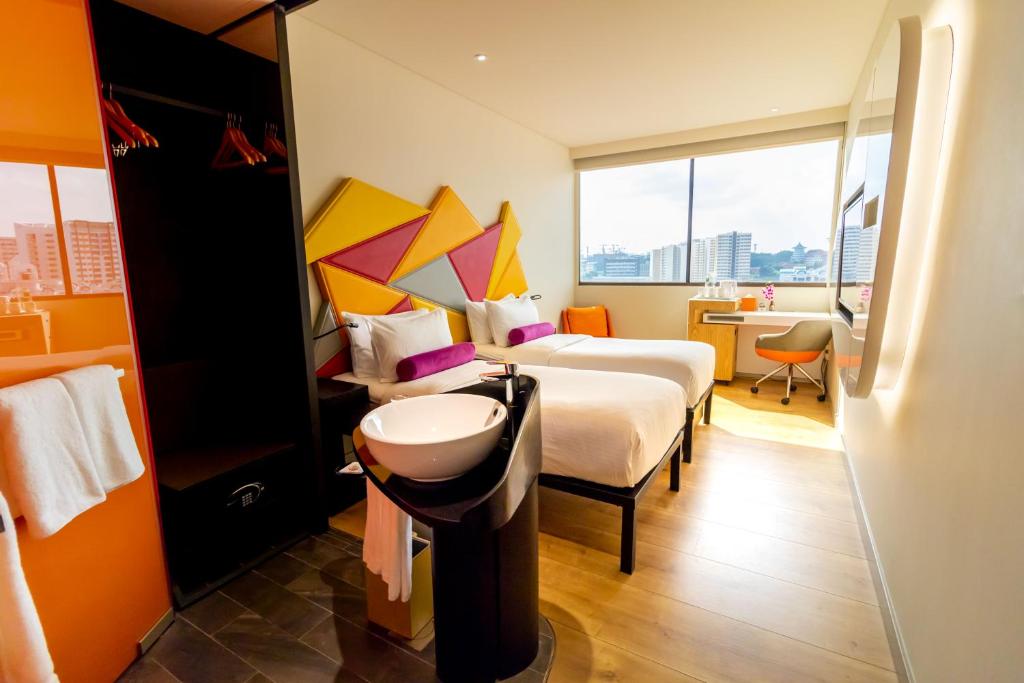 Двухместный (Стандартный двухместный номер с 2 отдельными кроватями) отеля Ibis Styles Singapore On Macpherson, Сингапур (город)