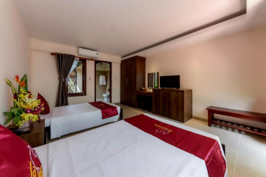 Двухместный (Двухместный номер с 2 отдельными кроватями и окном) курортного отеля La Paloma Bungalows & Spa, Дуонг-Донг