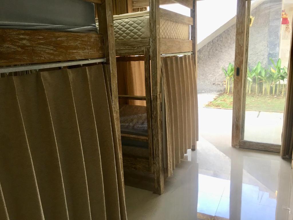 Номер (Кровать в общем номере с 4 кроватями), Arjuna Uluwatu Guest House