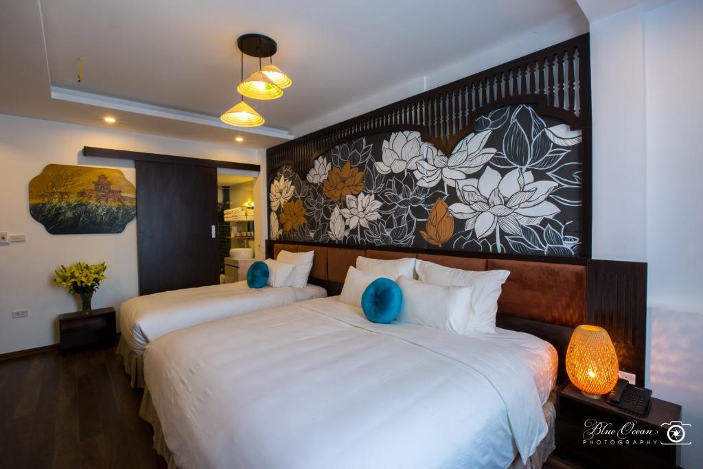 Двухместный (Двухместный номер Делюкс с 1 кроватью или 2 отдельными кроватями, вид на город) отеля Hanoi Lullaby Hotel and Travel, Ханой