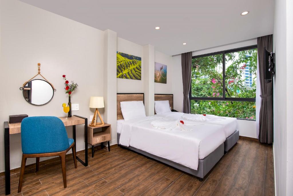 Двухместный (Двухместный номер «Премьер» с 2 отдельными кроватями) отеля Golden Lotus Central Hotel, Нячанг