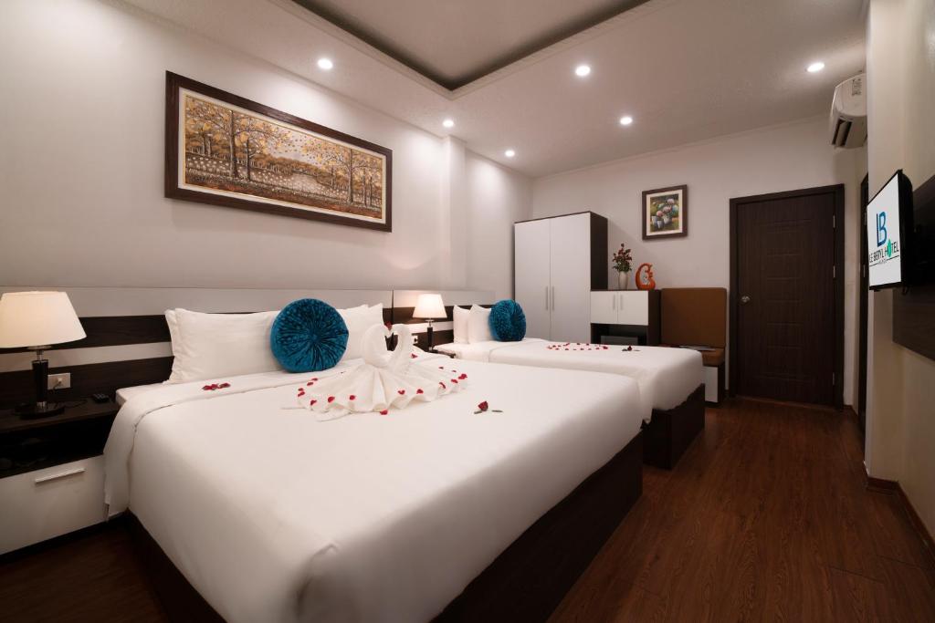 Двухместный (Двухместный номер Делюкс с 1 кроватью или 2 отдельными кроватями) отеля Le Beryl Hanoi Hotel, Ханой