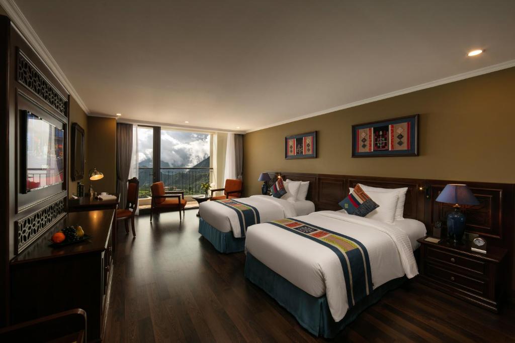 Двухместный (Двухместный номер Делюкс с 1 кроватью или 2 отдельными кроватями, вид на горы) отеля Pistachio Hotel Sapa, Сапа