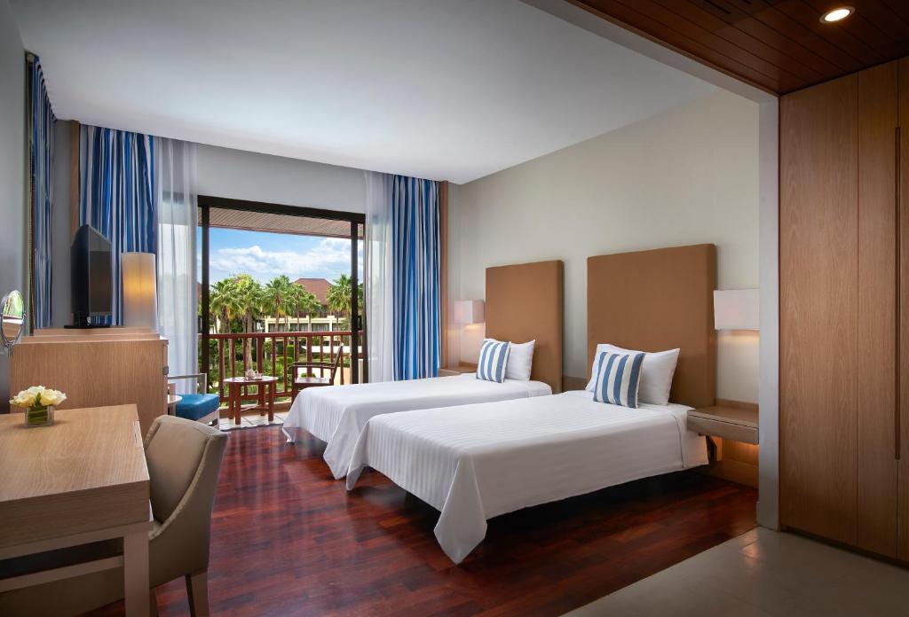 Двухместный (Двухместный номер Делюкс с 2 отдельными кроватями) курортного отеля The Tide Resort, Чонбури