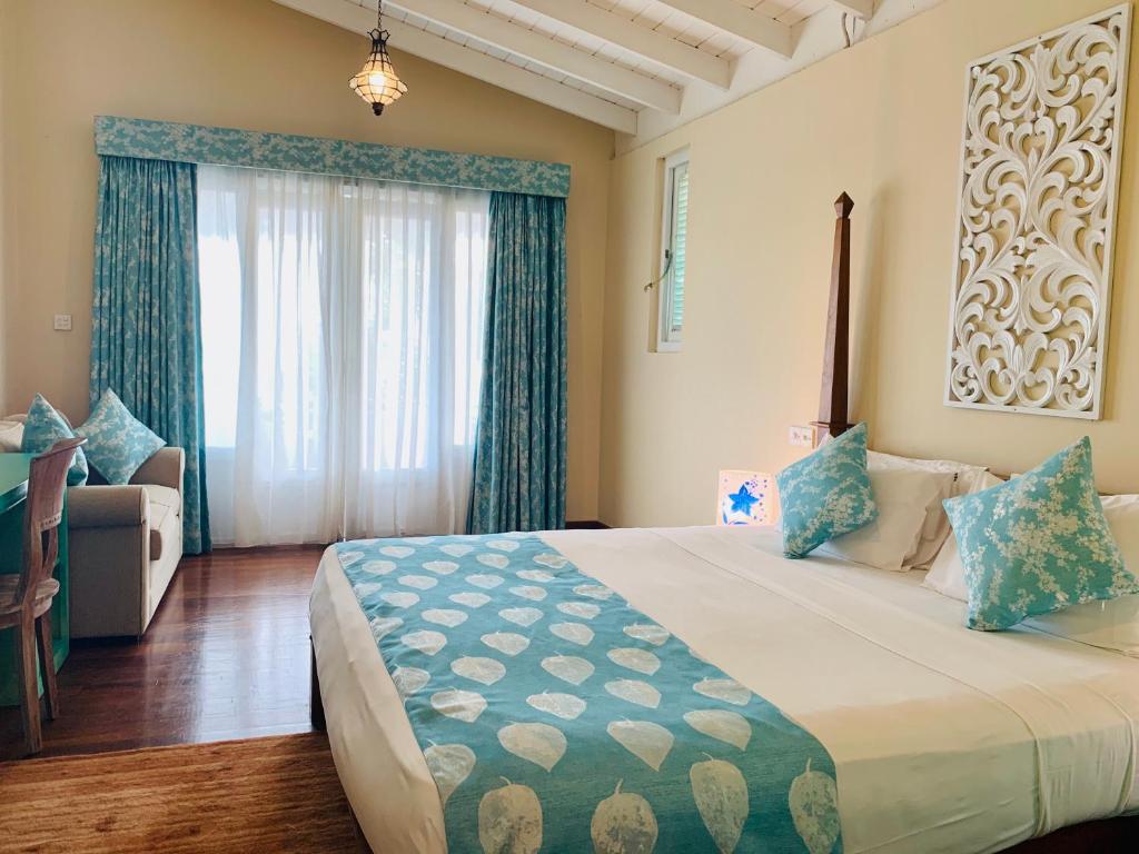 Трехместный (Улучшенный двухместный номер с 1 кроватью и видом на море) отеля Thaproban Beach House, Унаватуна