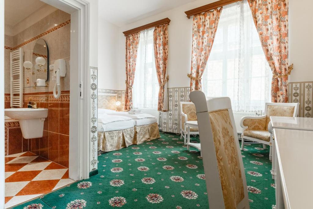 Двухместный (Двухместный номер с 1 кроватью или 2 отдельными кроватями) отеля Trinidad Prague Castle, Прага