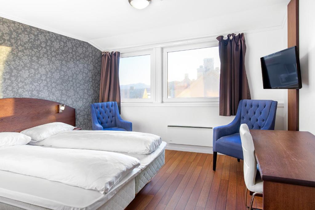 Двухместный (Улучшенный двухместный номер с 2 отдельными кроватями) отеля Comfort Hotel Fosna, Кристиансад