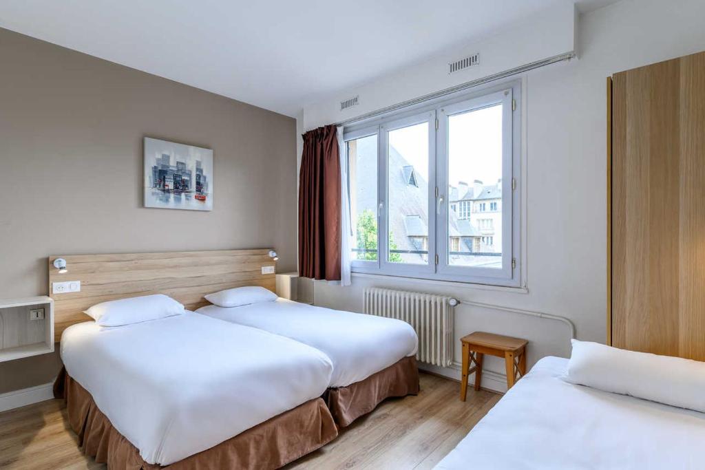 Трехместный (Классический трехместный номер - С 3 односпальными кроватями) отеля Comfort Hotel Rouen Alba, Руан