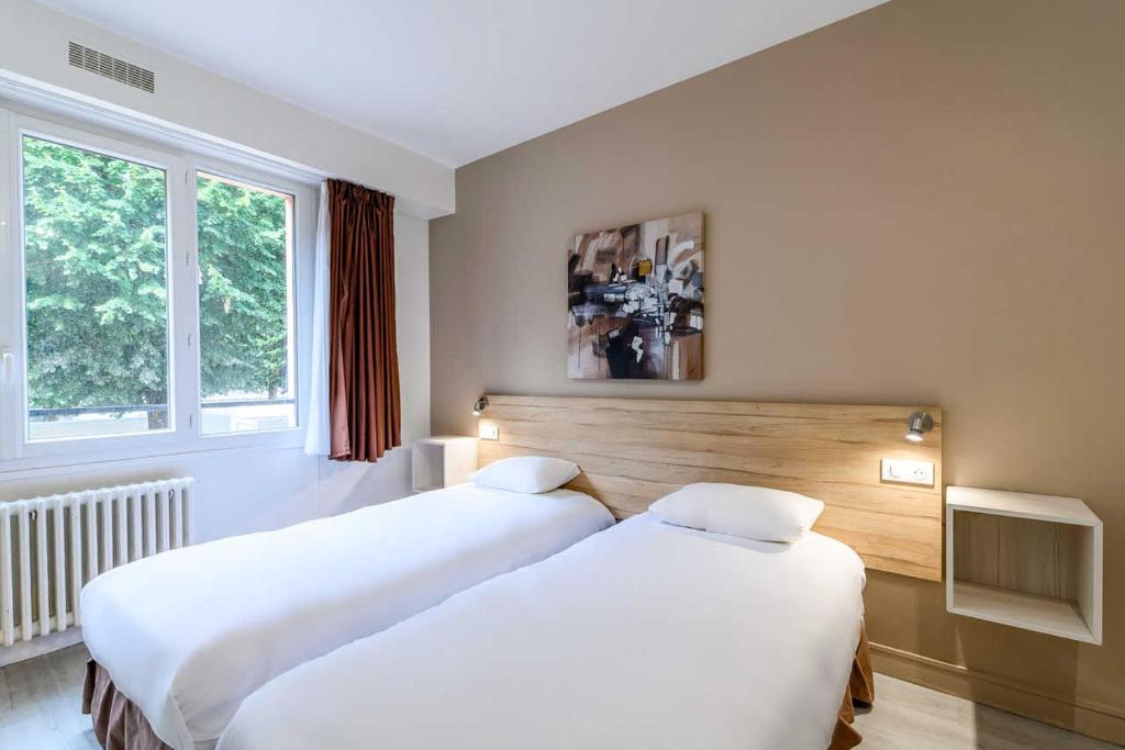 Двухместный (Двухместный номер «Комфорт» с 2 отдельными кроватями) отеля Comfort Hotel Rouen Alba, Руан