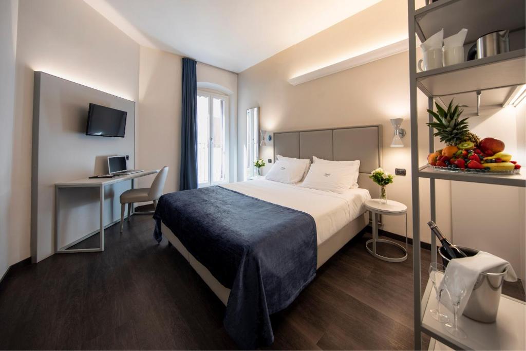 Двухместный (Улучшенный двухместный номер с 1 кроватью или 2 отдельными кроватями) отеля Hotel Touring, Болонья