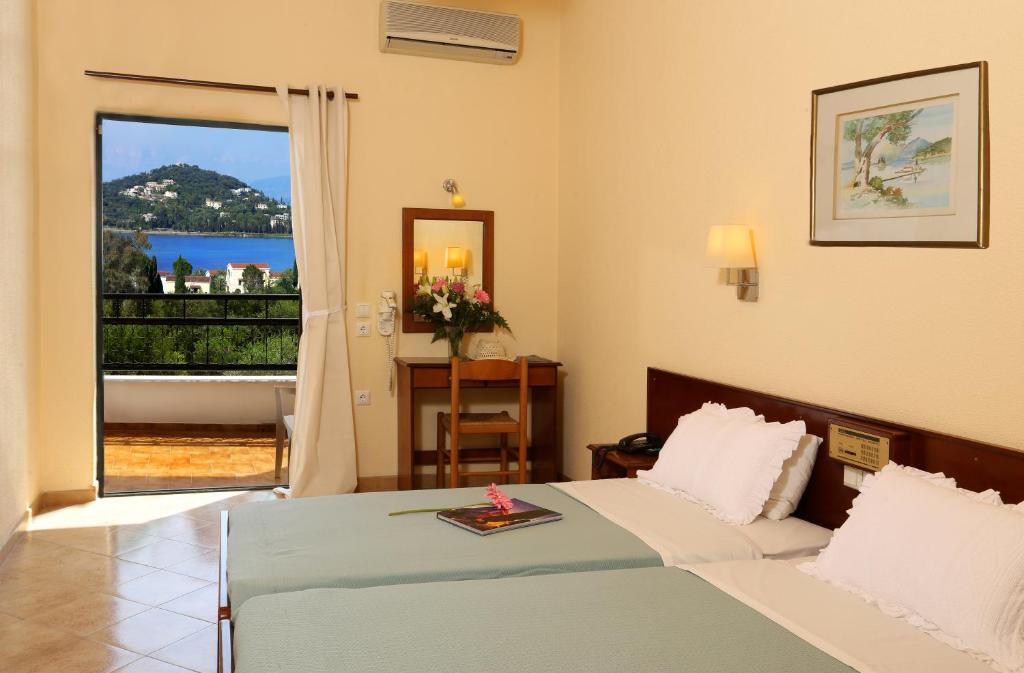 Двухместный (Стандартный двухместный номер с 1 кроватью или 2 отдельными кроватями и видом на сад) отеля Paradise Hotel Corfu, Гоувия