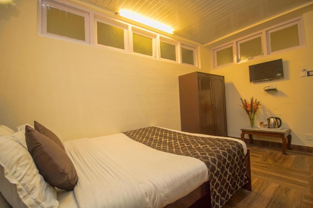 Двухместный (Двухместный номер Делюкс с 1 кроватью) отеля Jagjeet's Yuma, Дарджилинг