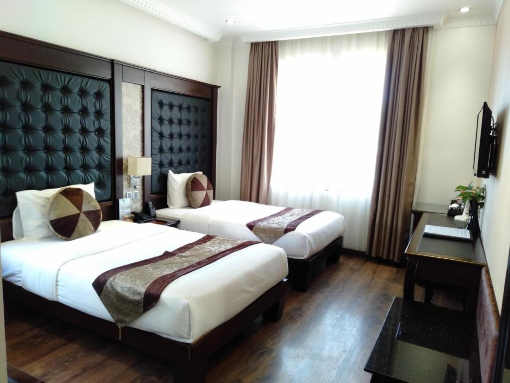 Двухместный (Двухместный номер с 2 отдельными кроватями и видом на море) отеля City Bay Palace Hotel, Халонг
