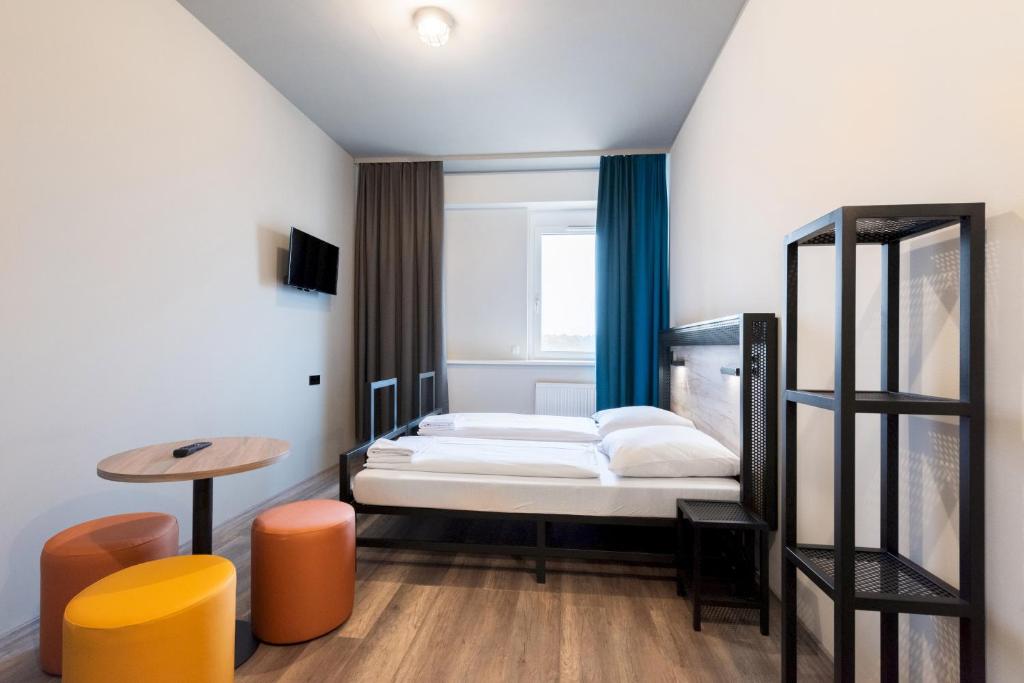 Двухместный (Двухместный номер с 2 отдельными кроватями) отеля A&O Stuttgart City, Штутгарт