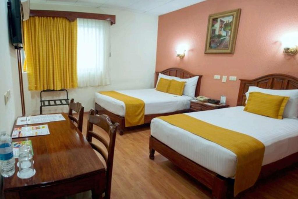 Трехместный (1 Double bed and 1 Single Bed - Non Smoking) отеля Best Western Hotel Madan, Вильяэрмоса