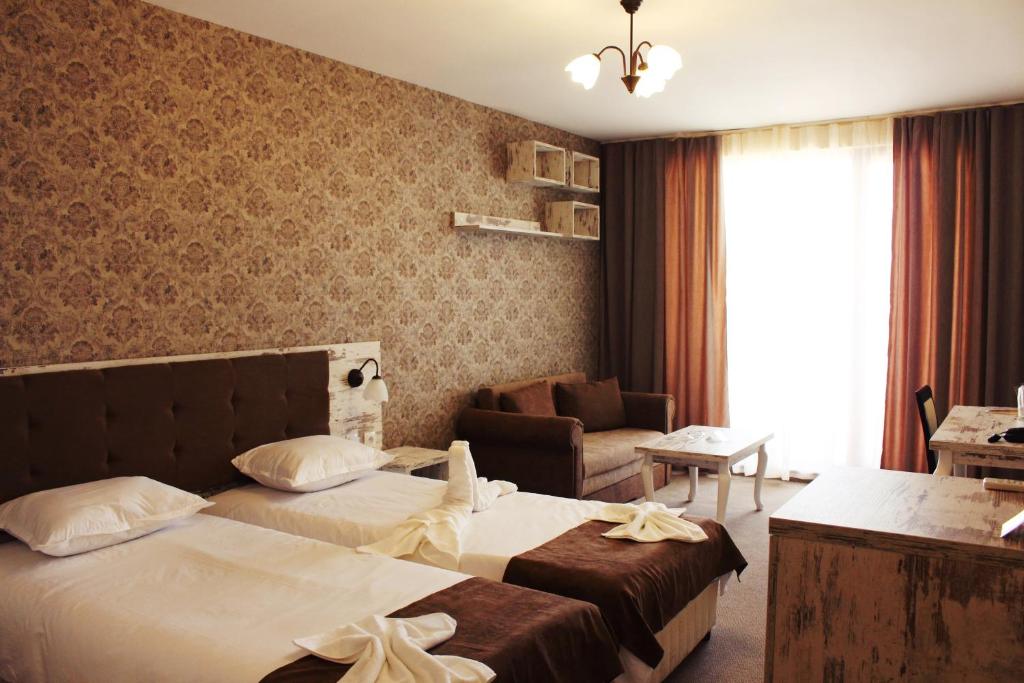Двухместный (Двухместный номер с 2 отдельными кроватями и балконом (для 2 взрослых и 1 ребенка)) отеля Paraizo Teopolis - All Inclusive, Обзор