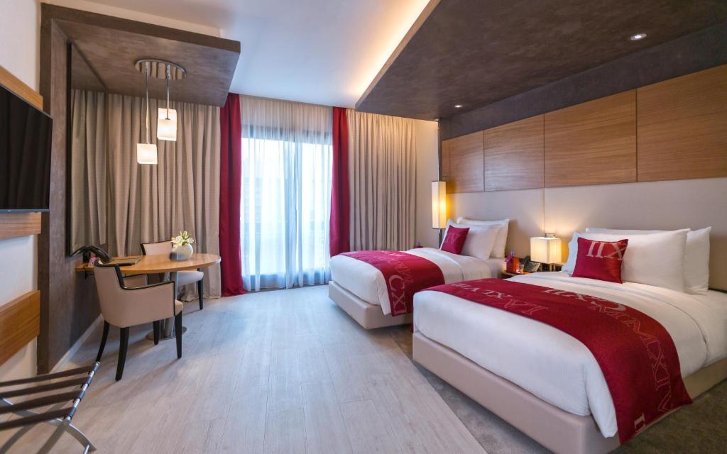Двухместный (Двухместный номер Делюкс с 2 отдельными кроватями) отеля Mövenpick Hotel du Lac Tunis, Тунис (город)