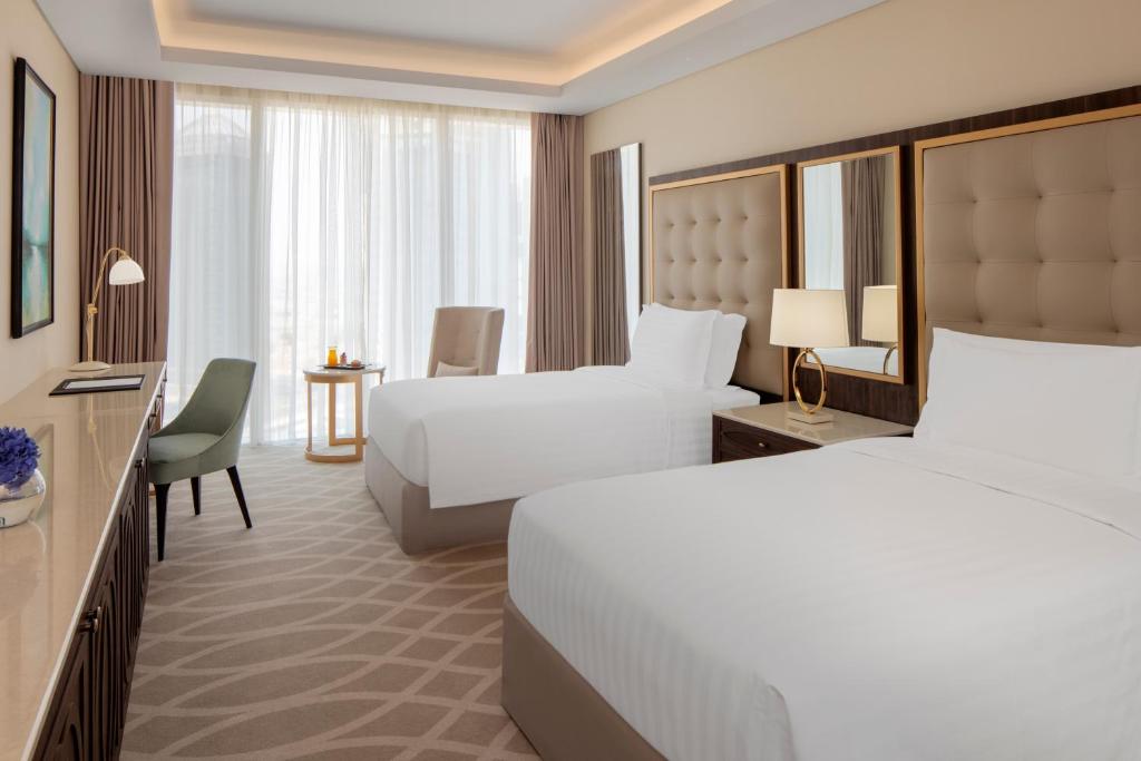 Двухместный (Улучшенный клубный номер с 2 отдельными кроватями) отеля Dusit Doha Hotel, Доха
