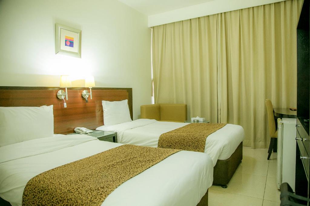 Двухместный (Стандартный двухместный номер с 1 кроватью или 2 отдельными кроватями) отеля Phoenicia Hotel, Дубай