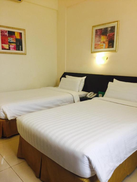 Двухместный (Двухместный номер с 2 отдельными кроватями) отеля Hotel Al Madinah Holiday, Маскат