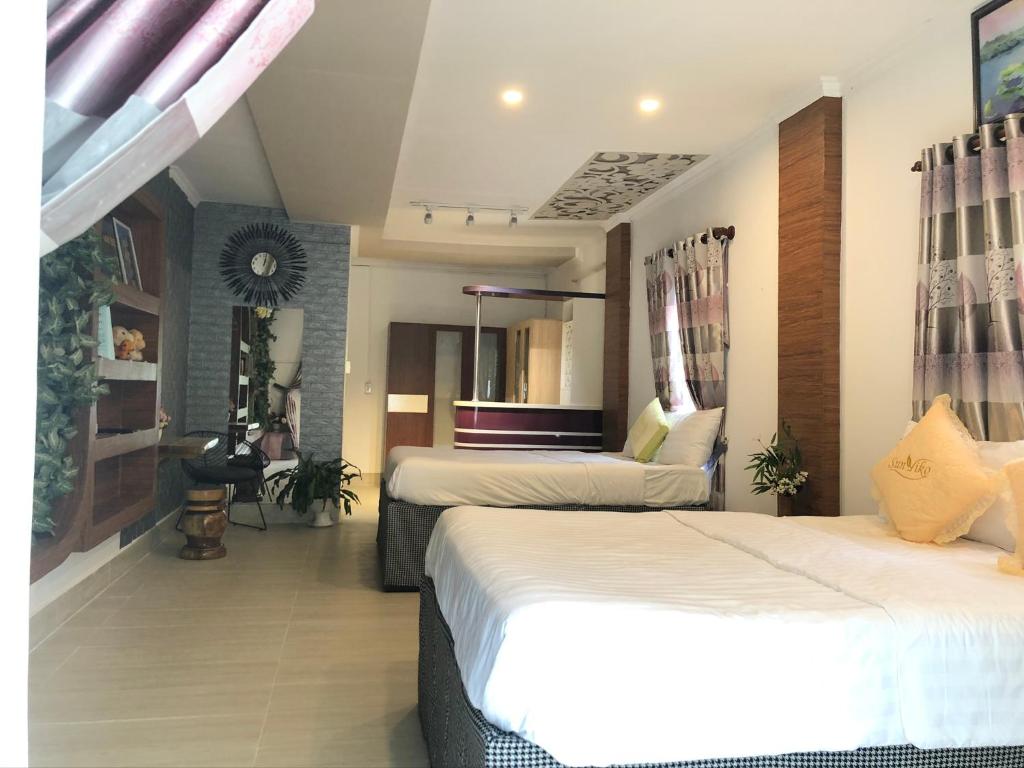Двухместный (Двухместный номер Делюкс с 1 кроватью или 2 отдельными кроватями) отеля Song Ngư Pisces Homestay, Кантхо